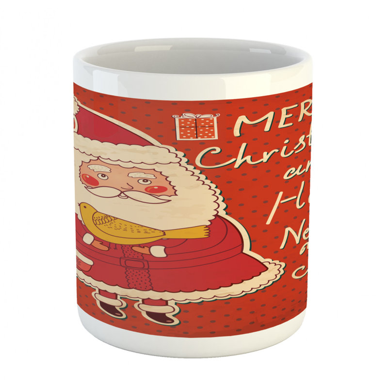 Tasse à café père noël holding oiseau