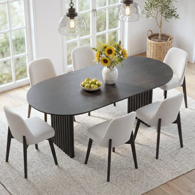 Janik 7 - Piece Oval Solid Wood Dining Table Set