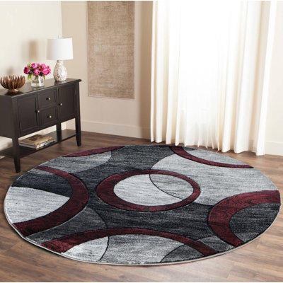 Tapis noir à motif abstrait Adonia