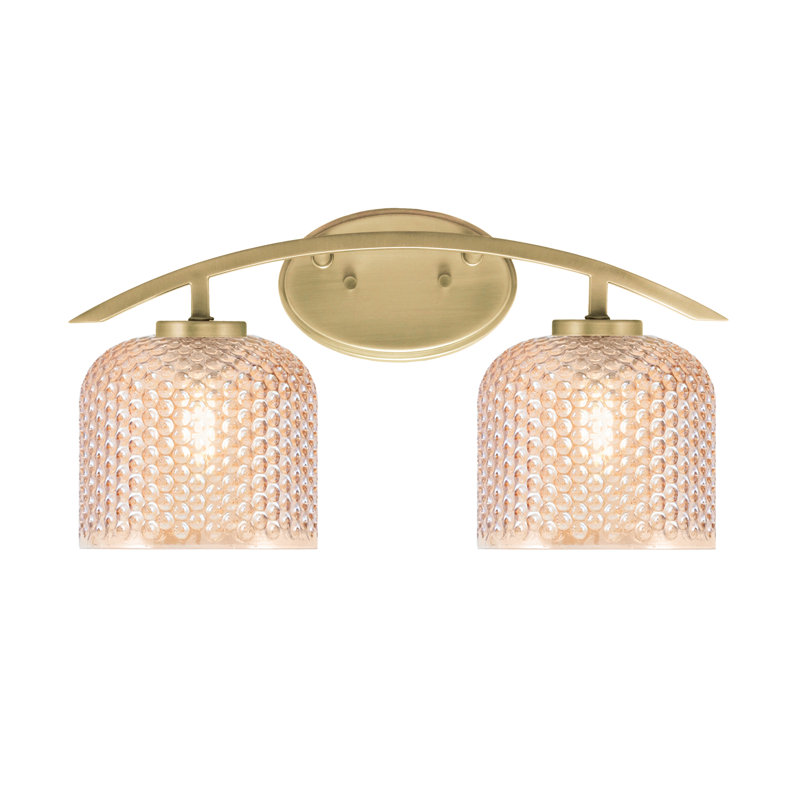Barre d'éclairage de salle de bain 2 lumières Olmsted, fini laiton vieilli avec verre texturé ambre de 6 po