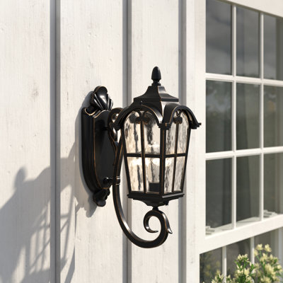 Luminaires muraux d'extérieur Antjelina Dusk to Dawn, noir romain avec verre ondulé