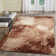 Abstract Machine Woven Polypropylene Area Rug in Orange