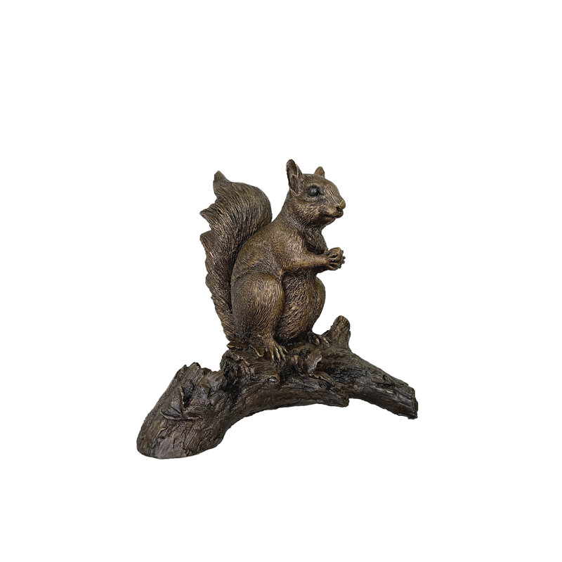 Figurine de table écureuil sur bûche
