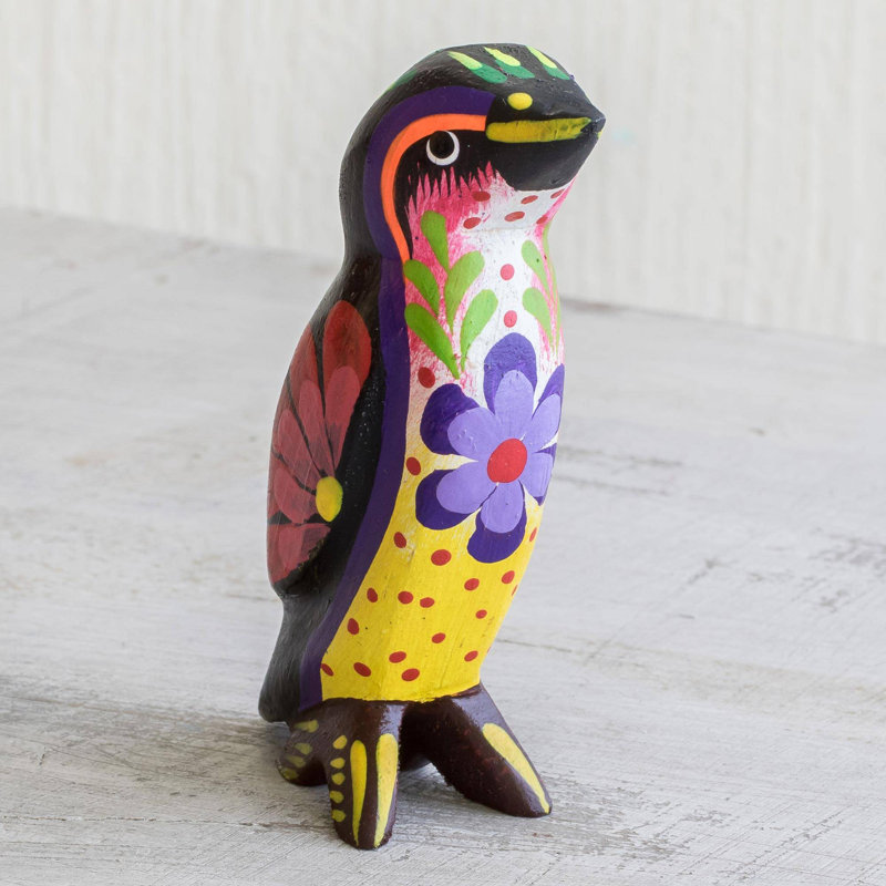 Figurine pingouin et bois