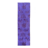Weda Geometric Area Rug in Purple