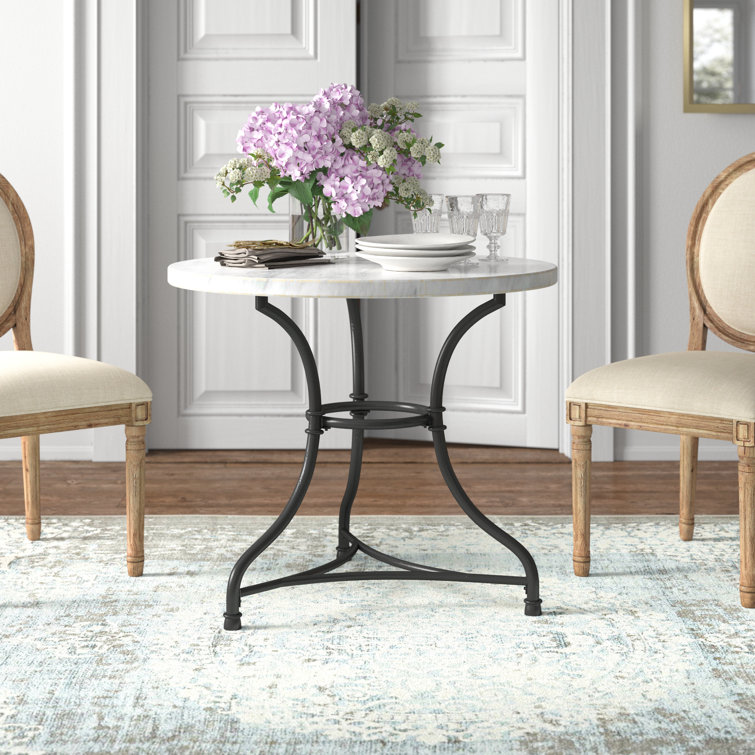 A French Round Marble Top Dining Table on Iron Base
