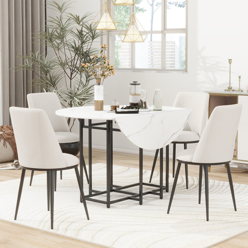 Ensemble de table de salle à manger extensible 5 pièces pour petits espaces - plateau rond en faux marbre avec structure noire, 4 chaises rembourrées, conception pliable compacte, blanc