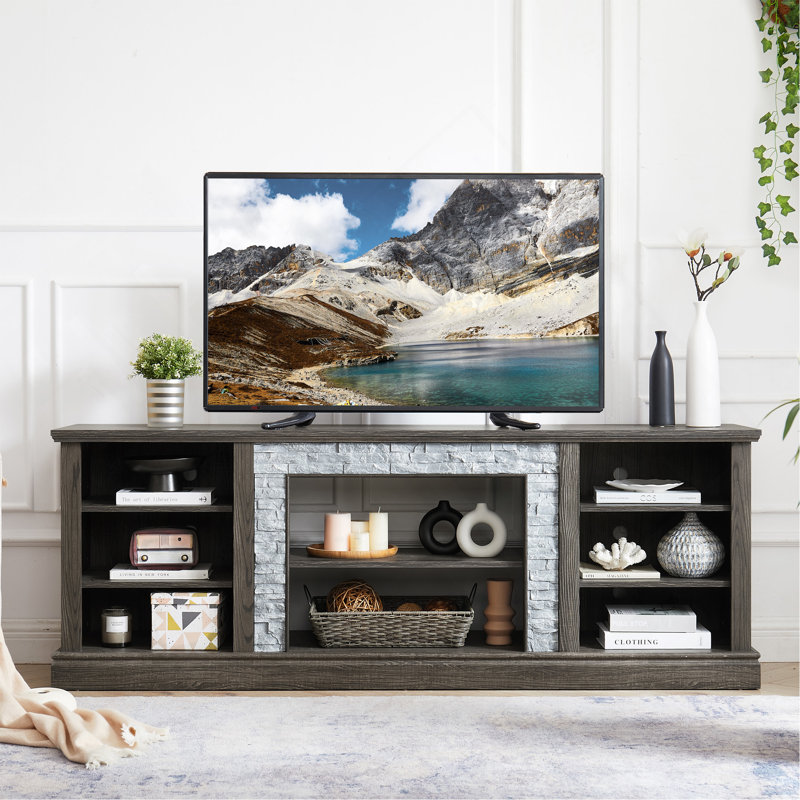 Grand meuble télé avec fausses pierres empilées, amplement de rangement et gestion des câbles pour les centres de divertissement modernes