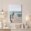 Tableau sur toile représentant une jetée en bois avec une rambarde en corde surplombant une eau turquoise-812377355