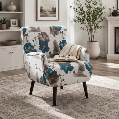 Fauteuil club moderne avec mousse haute densité, accoudoirs ronds et pieds en bois d'hévéa