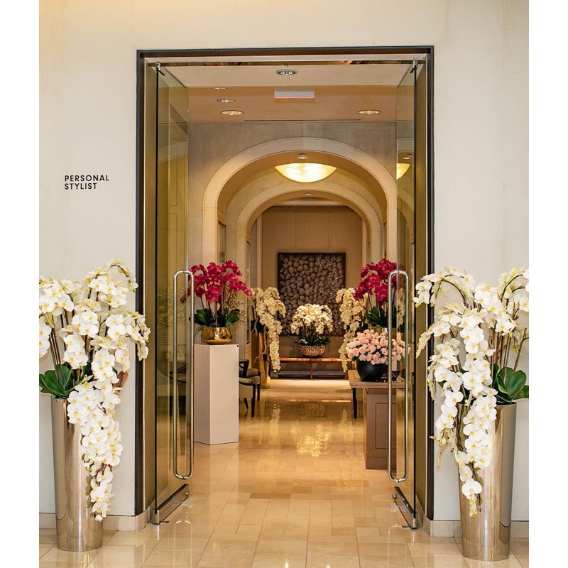 Cascading White Phalaenopsis Orchids In Tapered Polished  Cone Planter, Silver