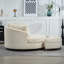 Fauteuil demi-tonneau rembourré avec repose-pieds-108805424