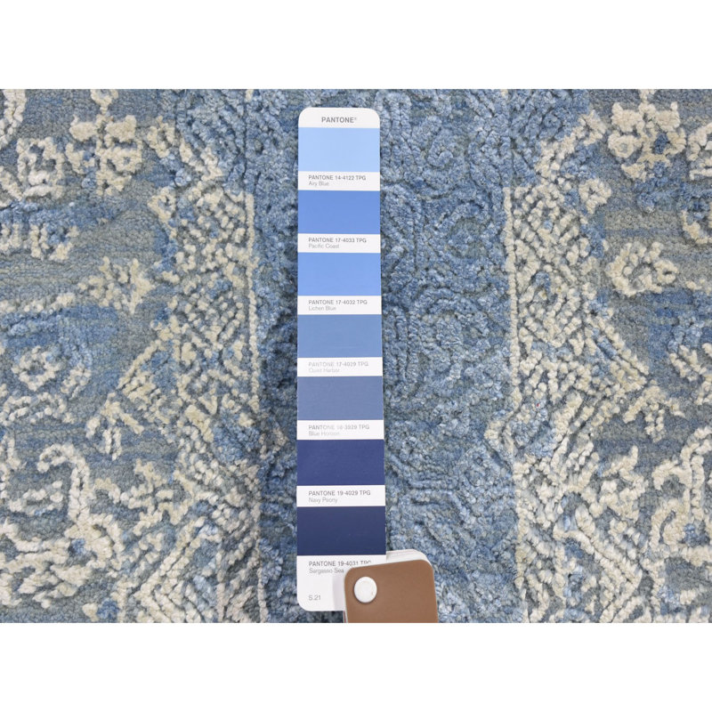 Tapis décoratif rond noué à la main bleu 8 pi 1 po one-of-a-kind Abdul-Quddus