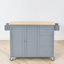 Îlot de cuisine mobile avec plateau en bois massif et roulettes verrouillables, largeur de 52,7 po, armoire de rangement et barre de petit-déjeuner à abattants, porte-épices, porte-serviettes et tiroir-349117936