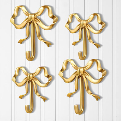 4 pieces of golden bow wall hanging