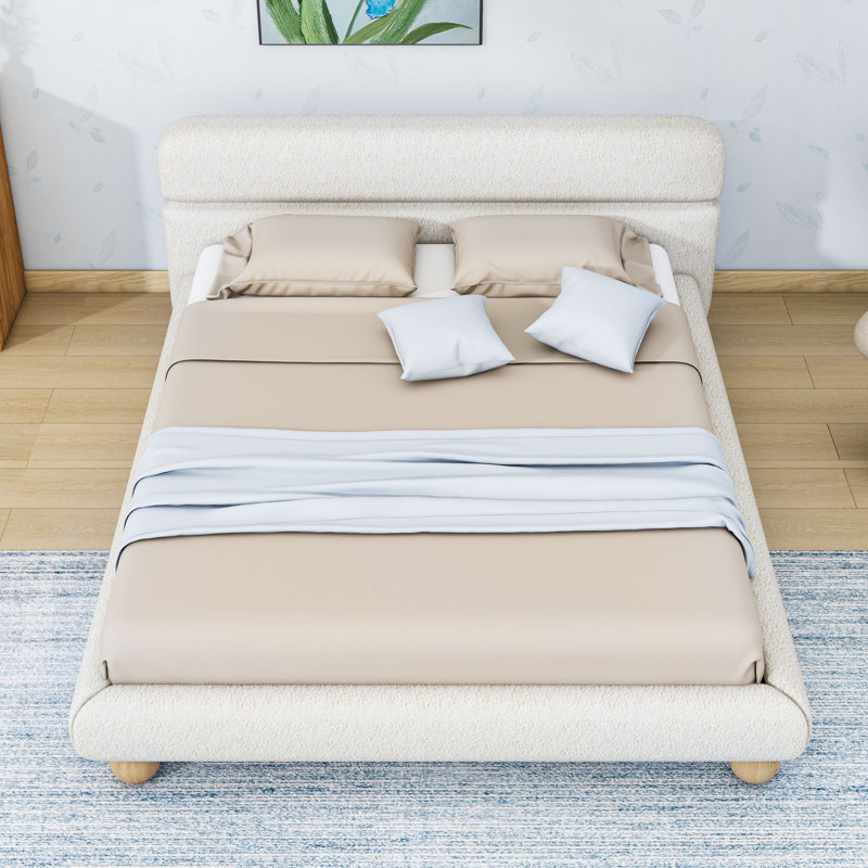 Grand lit plateforme tapissier avec tête de lit et pieds ronds