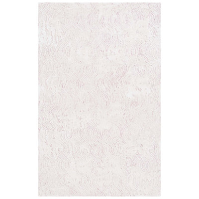 Tapis ivoire en laine et en coton touffeté à la main Glamour