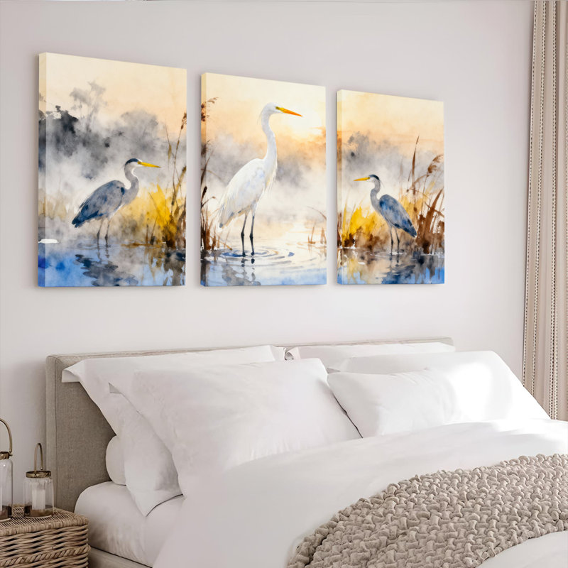 Ensemble de 3 tableaux sur toile tendue représentant des hérons dans un paysage de marais brumeux, H 30 po x l 60 po