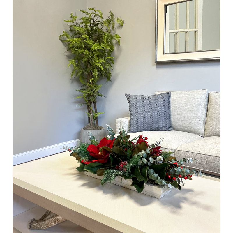 Holiday Centerpiece with Magnolias, Eucalyptus and Berries