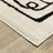 Hennings Mid-Century Modern Beige/ Black Area Rug-1408701485