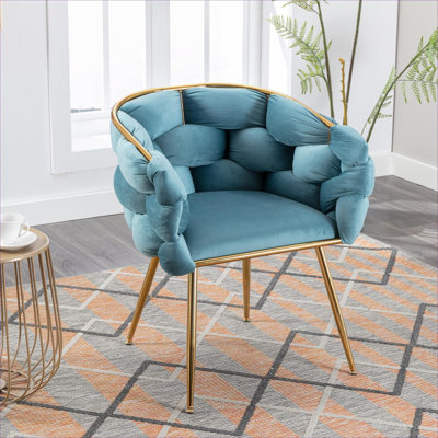 Chaise rembourrée en velours bleu
