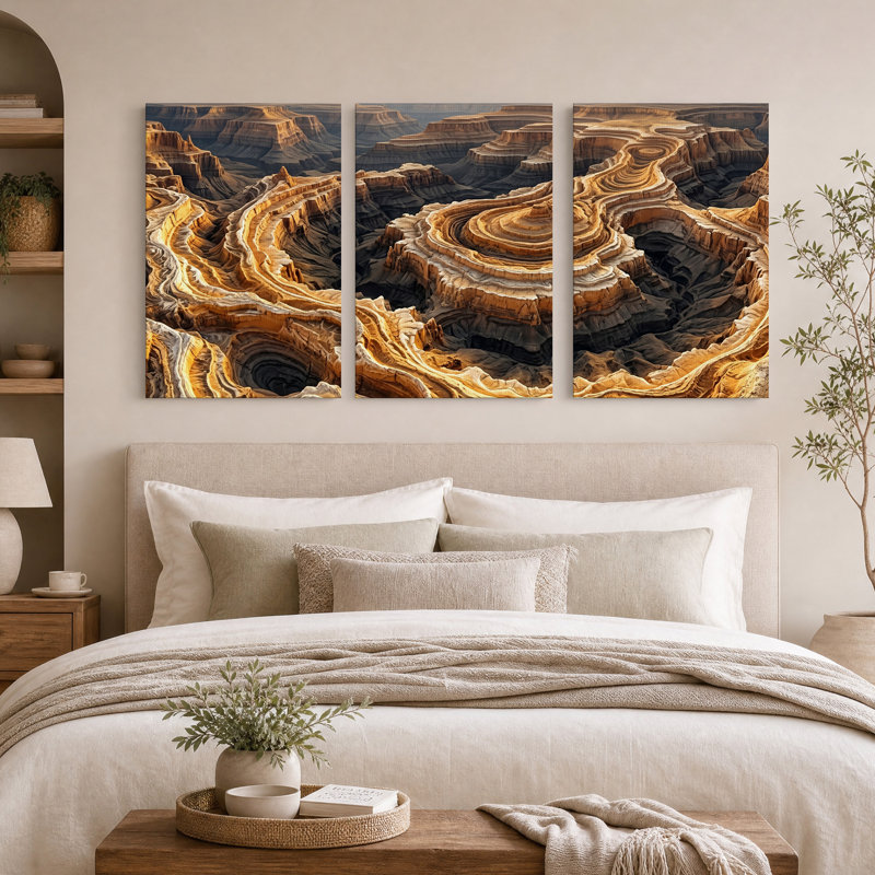 Ensemble de 3 toiles murales représentant des formations rocheuses de canyon stratifiées sous une lumière dorée