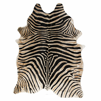 Tapis beige / noir / brun en cuir de vache fabriqué à la main khanna