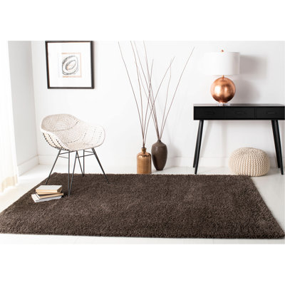 Jiang Brown Area Rug