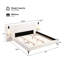 Très grand lit tapissier blanc très grand avec lumières et tablettes, idéal pour la détente nocturne