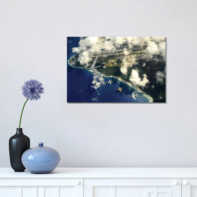 A B-52 Stratofortress Leads A Formation Of Aircraft Over Guam II by Stocktrek Images - Wrapped Canvas Print
