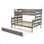 Lit superposé simple au-dessus d'un lit double avec lit gigogne en bois-395362882