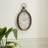 Mauney Metal Pocket Watch Style Decorative Black Wall Clock with Rope Accent