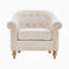 Fauteuil capitonné