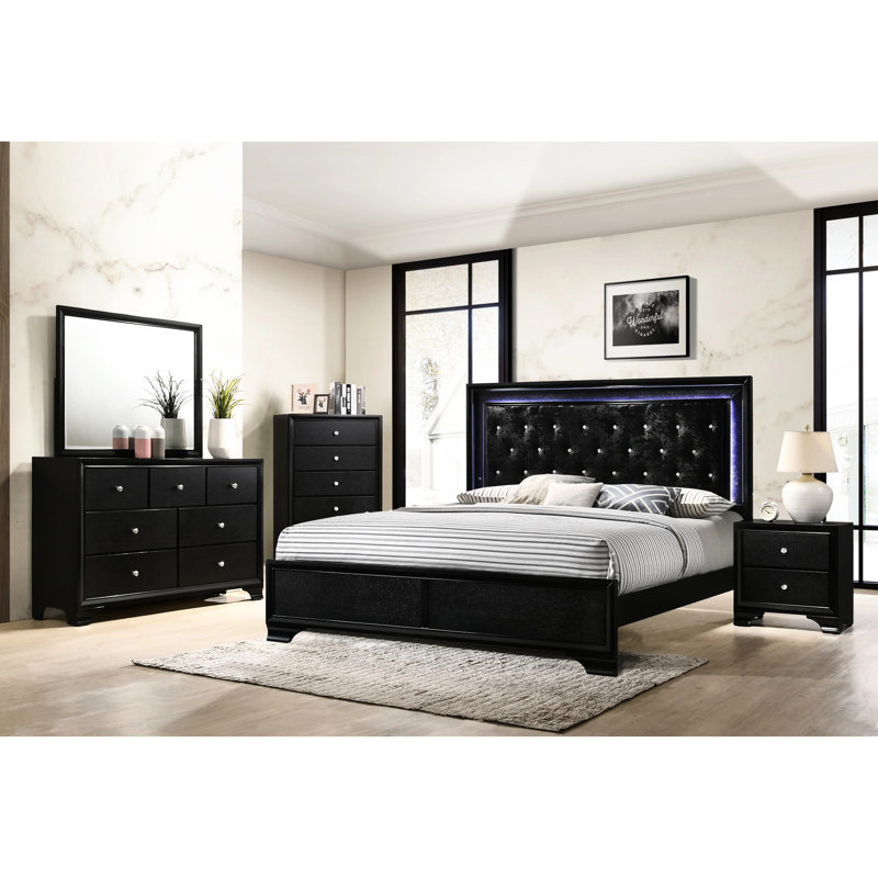 Lit tapissier très grand avec finition noire et tête de lit capitonnée à losanges