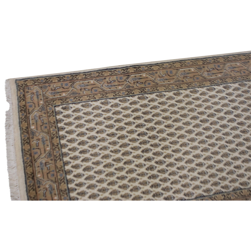 Hand Knotted Wool Area Rug in Cream And Peach
