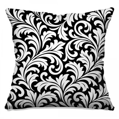 Coussins décoratifs noirs et blancs damassés