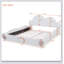 Grand lit plateforme tapissier à tête de lit grand format avec pied de lit arrondi et poche-7376135