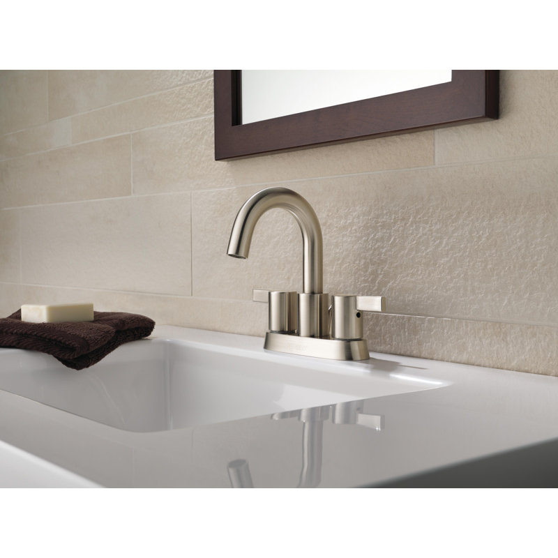 Robinet de salle de bain central à deux poignées avec drain Precept, Nickel brossé