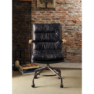 Fauteuil sophistiqué bleu rétro avec rembourrage en mousse et chaise de bureau au fini cuir confortable