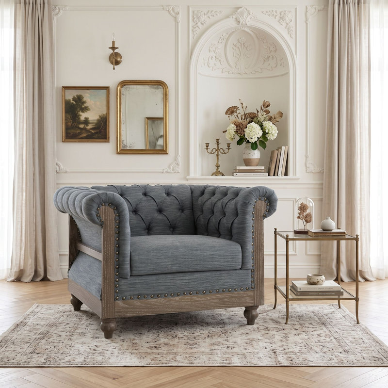 Fauteuil club capitonné
