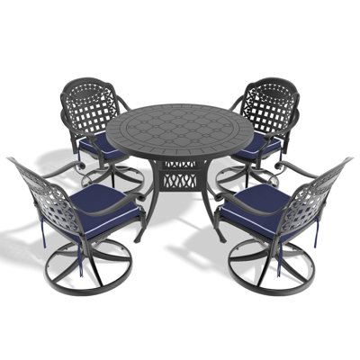 L'ensemble de salle à manger en aluminium coulé Allweather comprend des chaises pivotantes et une table ronde de 47,24 po avec un cadre noir