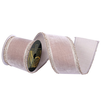 4" x 5yd Velvet Wired Ribbon with Champagne Jewel Applique Trim. Pewter Backing. Measuring 4 inches in width and 5 yards in length, it's perfect for a variety of festive projects.