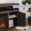 Meuble télé avec foyer électrique pour téléviseur de 65 po ou moins Claycomo-2113888709