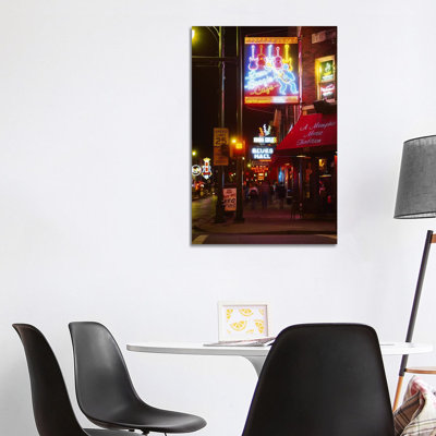 Neon Sign Lit Up At Night In A City, Rum Boogie Cafe, Beale Street, Memphis, Shelby County, Tennessee, USA by Panoramic Images - Wrapped Canvas Print