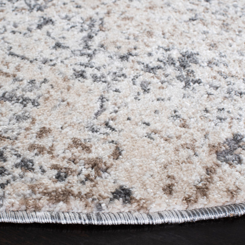 Ivory and Grey Abstract 10' x 14' Stain-Resistant Synthetic Area Rug