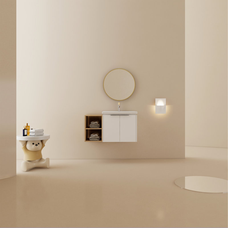 Meuble-lavabo luxueux avec portes et évier à fermeture en douceur, avec une petite tablette de rangement pour plus de commodité.