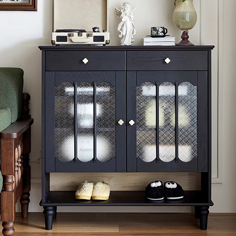 Élégante armoire noire avec portes en verre