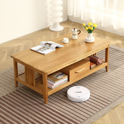Table basse à quatre pieds en bois massif avec rangement