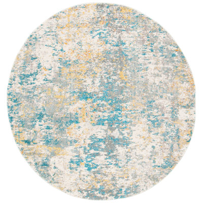 Besfort Abstract Ivory/Teal/Gold Area Rug