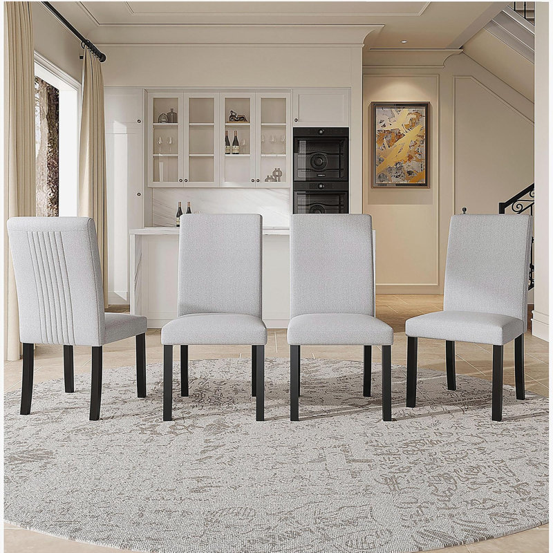 Ensemble de 4 chaises de salle à manger modernes, chaises de salle à manger d'appoint rembourrées en tissu avec pieds en bois massif et siège rembourré - beige